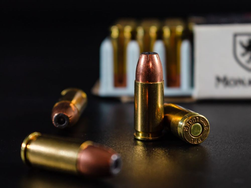 9mm cartridges and a box of ammunition